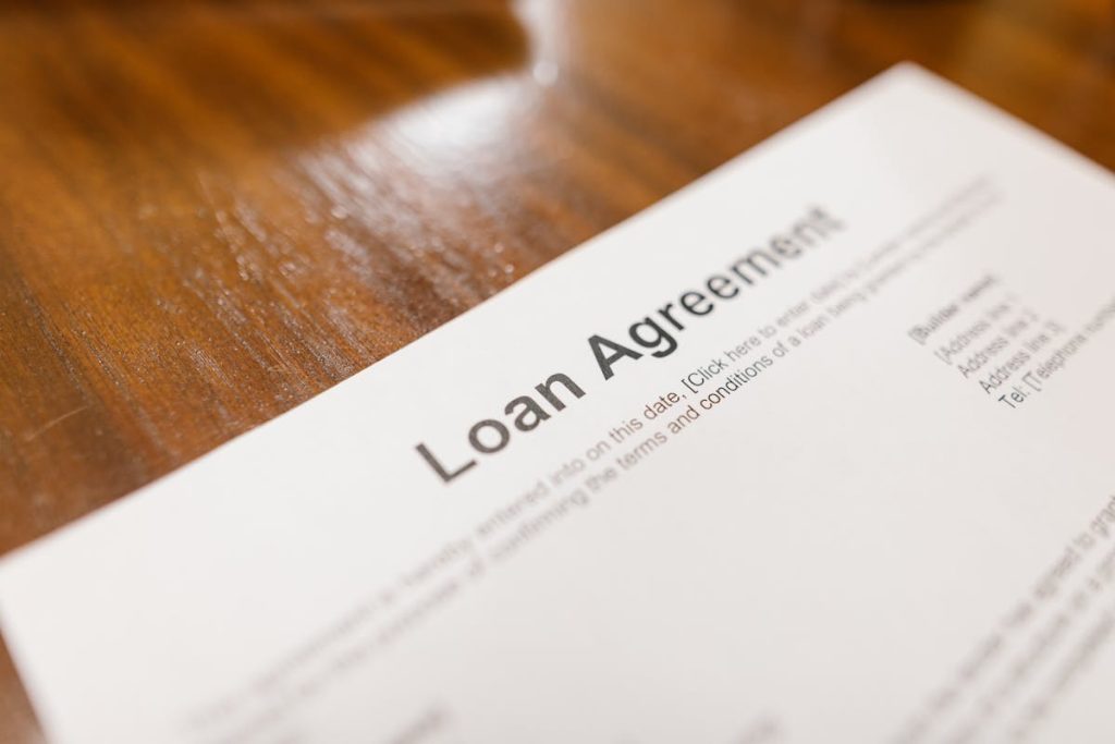 Loan agreement document close-up on table